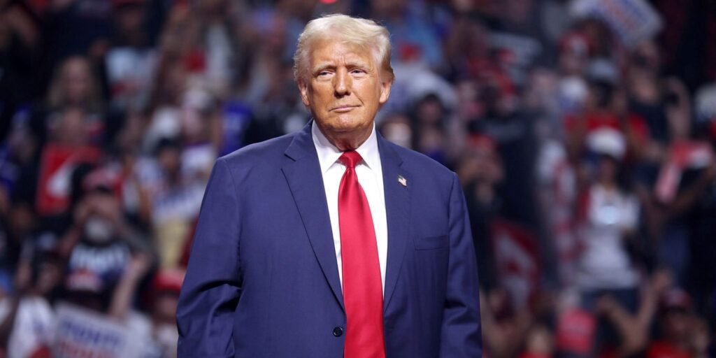 President Trump in blue suit with red tie